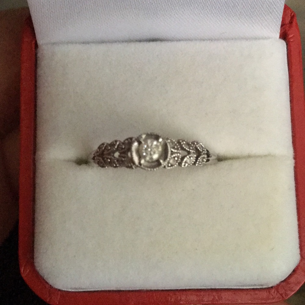 Bond Jewelers 10k white Gold and diamond ring.